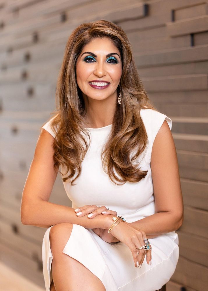 Woodlands Wellness & Cosmetic Center Logo